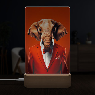 Lampa slon v oranžovém obleku